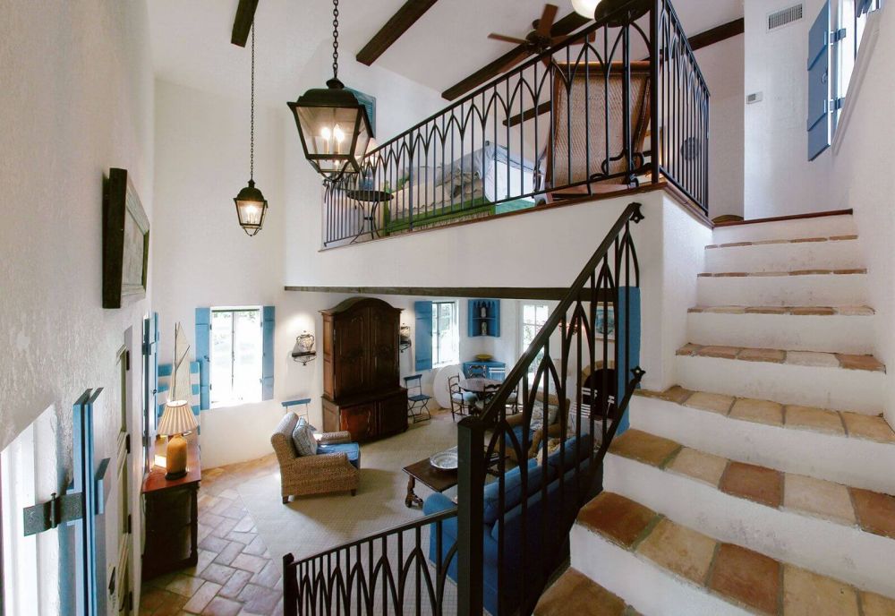 guest house with stone accents