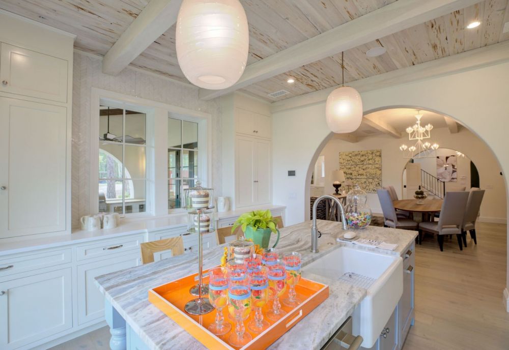 Custom kitchen with arches by Ramsey McHale